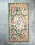 Green Oriental carpet